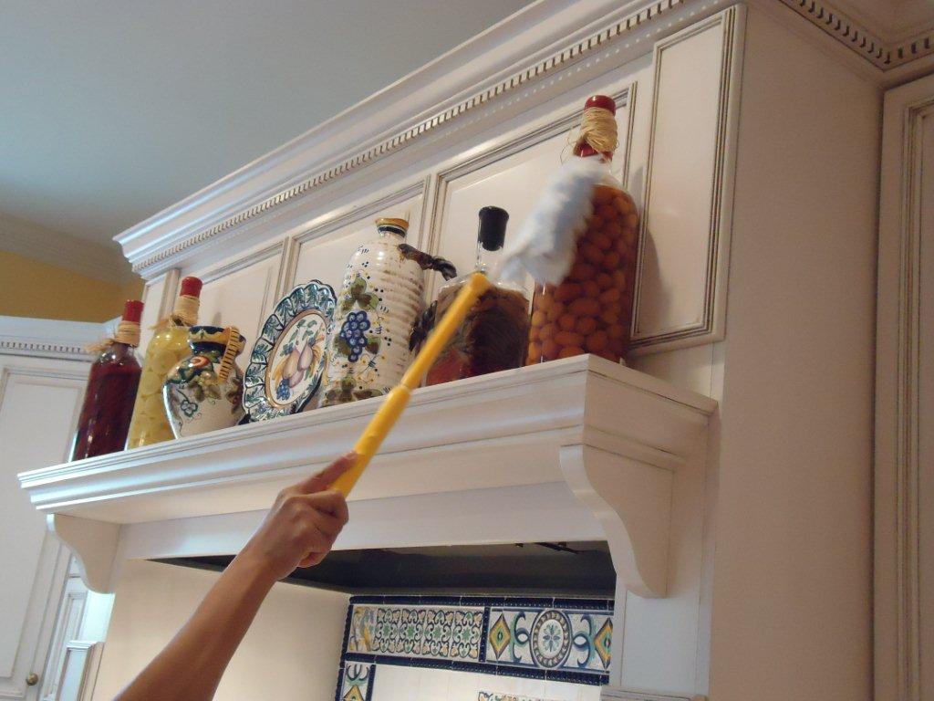 Dusting decorative shelving and hard-to-reach details
